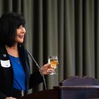 President Mantella giving speech with glass in hand